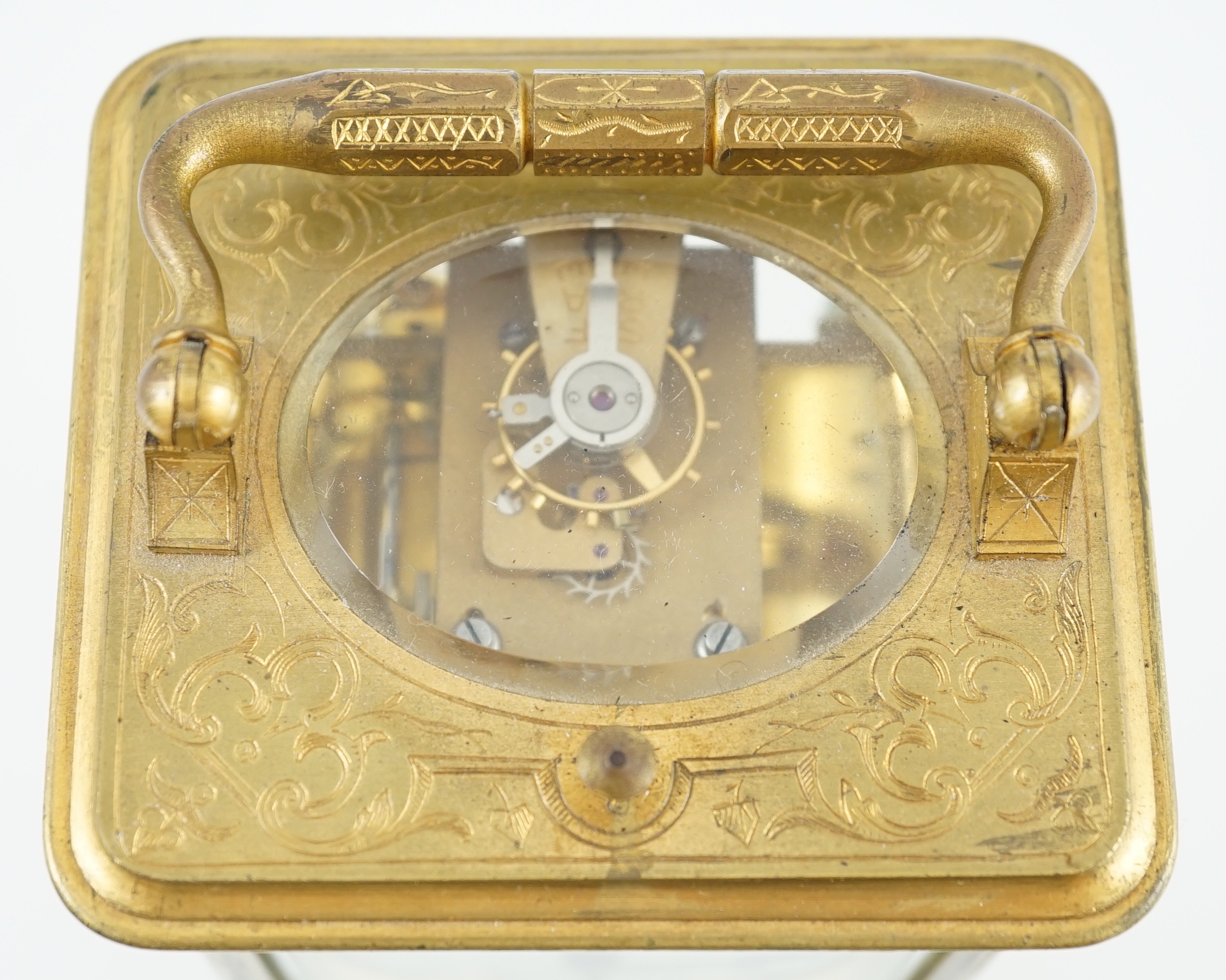 A late 19th century French gilt brass repeating carriage clock, width 8cm depth 7.5cm height 13cm